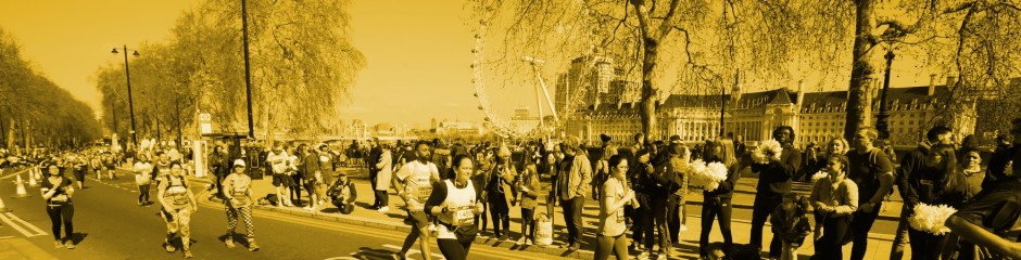 London Landmarks Half Marathon runners passing the London Eye