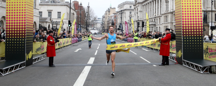 Runner passing the LLHM finish line