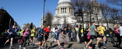 Runners passing St. Pauls at the London Landmarks Half Marathon