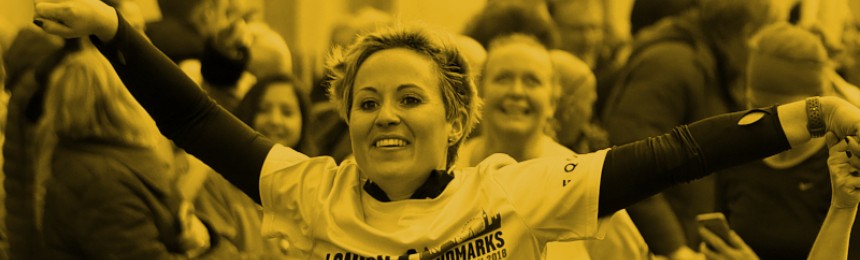An LLHM runner crossing the finish line