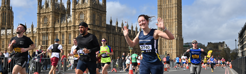 Woman running under big ben