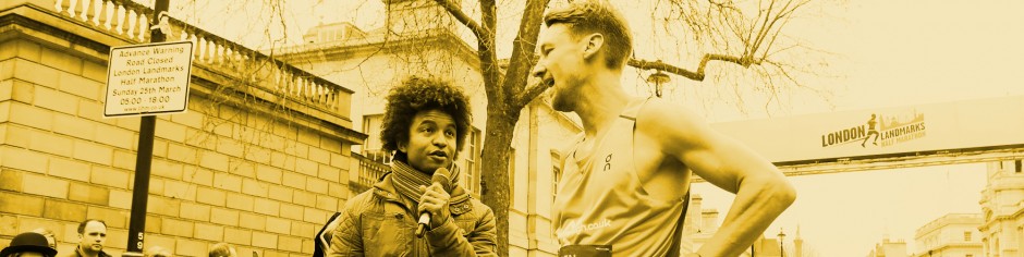 Presenter Radzi Chinyanganya interviewing a runner at the finish line