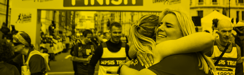 LLHM runners hugging at finsh line
